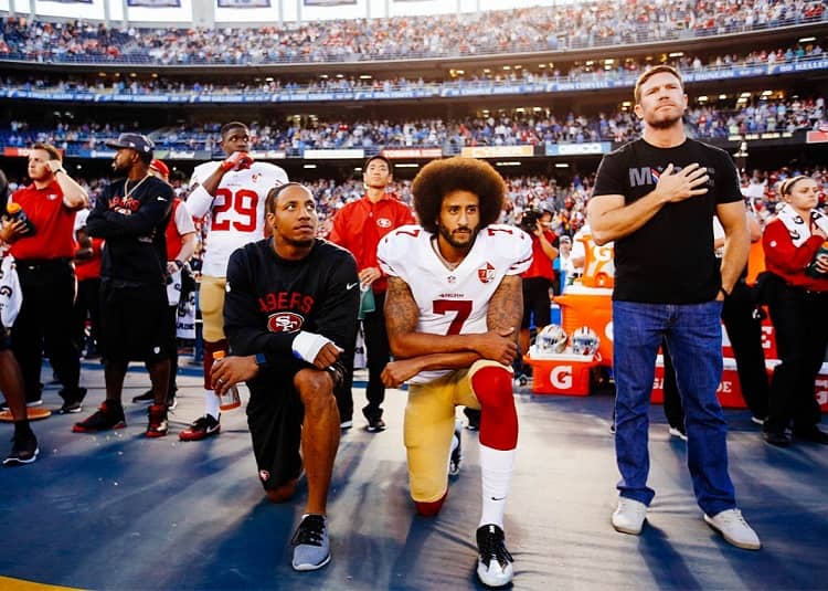 kaepernick kneels during national anthem 750